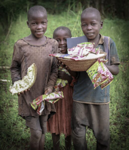 kids holding jack fruit as breakfast